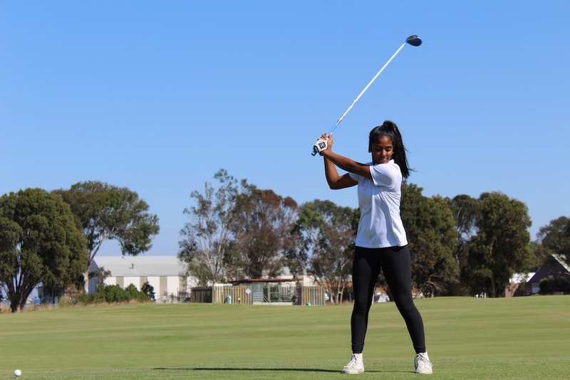 A young golfer on the course