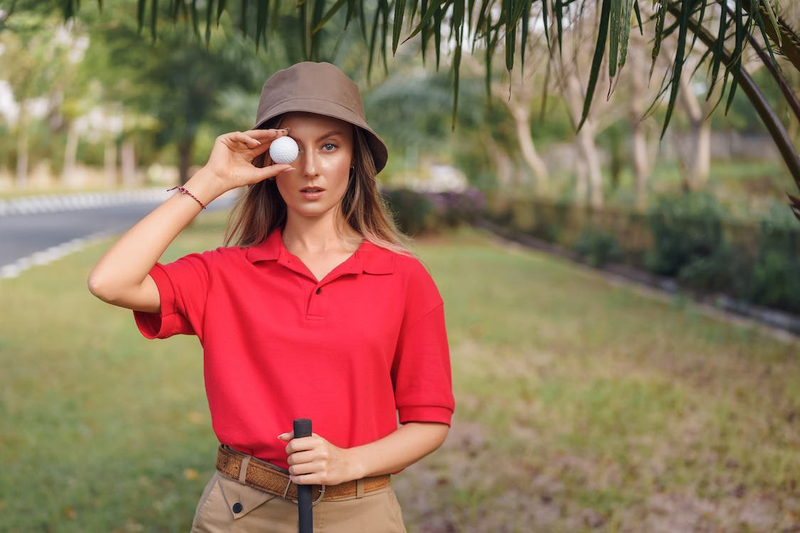 A golfer posing for the camera